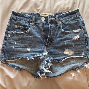 ripped blue jean shorts